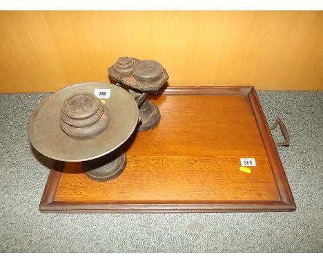 A mahogany serving tray, a bevel edged wall mirror and a set of weighing scales (3)