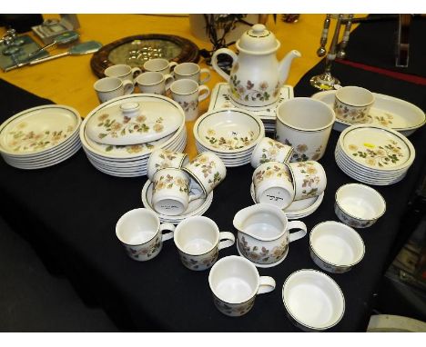 A large collection of ceramic tableware, approximately 60 pieces, decorated in the Autumn Leaves pattern (qty)
