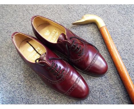 A pair of gentleman's unused Country Classic shoes, size 6 and a brass handled walking stick (2)