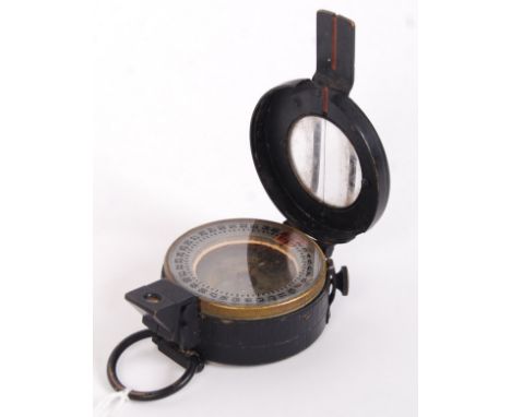 An original WWII Second World War 1941 MkIII military navigational compass by T.G Co. Ltd, London. No.B130572 marked to rever