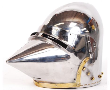 A fantastic 20th century reproduction medieval style Bascinet knight's suit of armour helmet. Two piece, steel construction, 