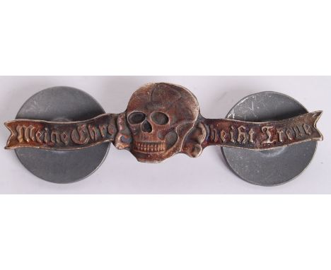 A reproduction 20th century Nazi German Third Reich Waffen ' Meine Ehre Heisst Treue ' breast plate with SS Totenkopf to fron