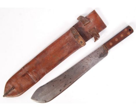 An original WWII Second World War British Army machete marked ' J.J.B 1943 ' to blade. With in a brown leather sheath stamped