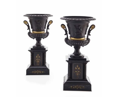 PAIR OF FRENCH PATINATED AND GILT BRONZE CAMPANA URNS  19TH CENTURY  each cast with figures of Britannia above a reeded base 