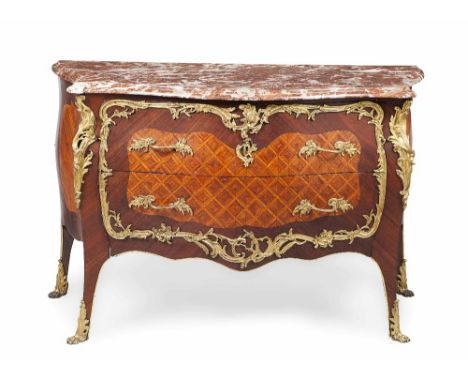 LOUIS XV STYLE AMARANTH AND KINGWOOD PARQUETRY MARBLE TOPPED COMMODE  19TH CENTURY  the shaped rouge marble top with a moulde