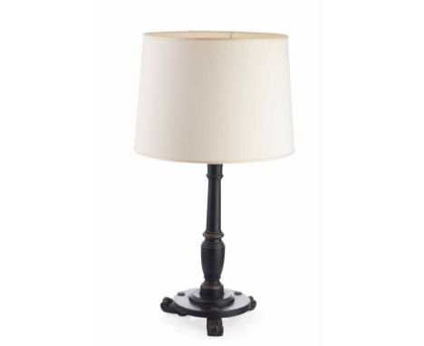 EBONISED AND PARCEL GILT LAMP  MODERN  the knopped column on a circular base with a reeded edge and raised on scroll feet; wi