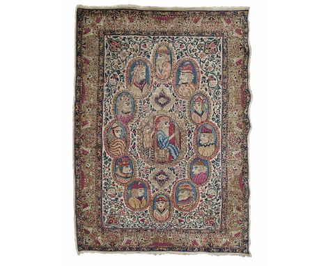 KIRMAN PICTORAL RUG  SOUTHEAST PERSIA, LATE 19TH/EARLY 20TH CENTURY  the cream field with central oval portrait medallion sur