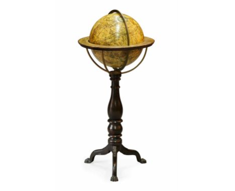 12 IN. CELESTIAL GLOBE BY DONALDSONS  CIRCA 1830  on a baluster turned support and tripod base ending in carved paw feet  93c