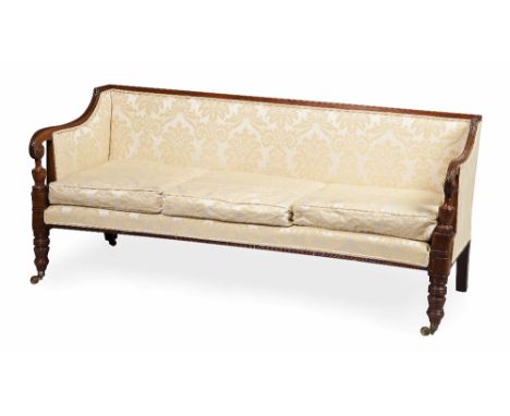 REGENCY MAHOGANY FRAMED SOFA  19TH CENTURY  the low straight back and downswept enclosed arms with baluster turned scroll sup