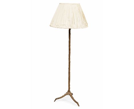 GILT METAL EXTENDING FLOOR LAMP  LATE 19TH / EARLY 20TH CENTURY  the slender standard cast with rising palmettes, on a tripod