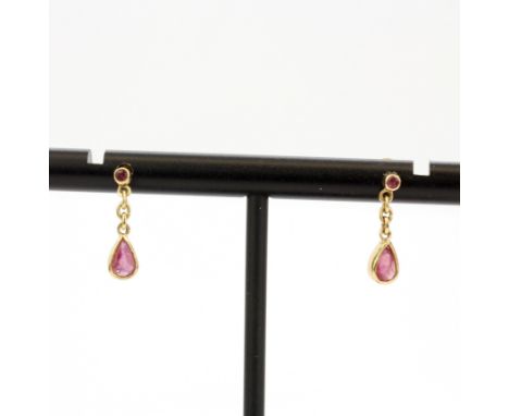 A pair of 9ct yellow gold ruby set drop earrings, L. 1.5cm.