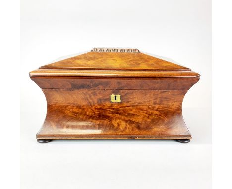 A Georgian mahogany tea caddy, 36 x 20 x 21cm. together with a glass mixing bowl.