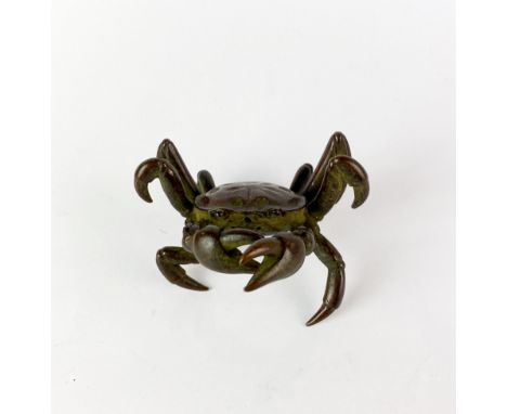A signed Japanese bronze model of a crab, W. 6cm. H. 3.5cm.