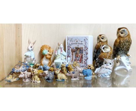 A group of Royal Albert Peter Rabbit figures with further Wade and Nao figures, some with boxes.