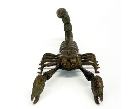 A Japanese bronze articulated model of a scorpion, L. 8.9cm.