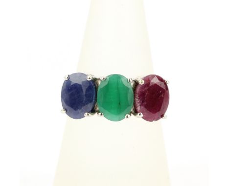 A 925 silver ring set with a large oval cut ruby, sapphire and emerald, (O.5).With certificate.