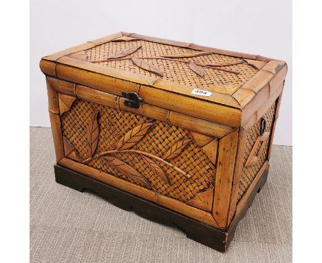 An Oriental bamboo trunk, 52 x 33 x 39cm.