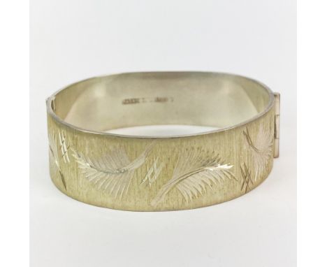 A heavy silver 1970's engraved bangle.