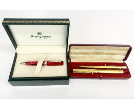 A Swan gold plated fountain pen with 14ct gold nib together with a Fyne Poynt gold plated propelling pencil and Montegrappa b