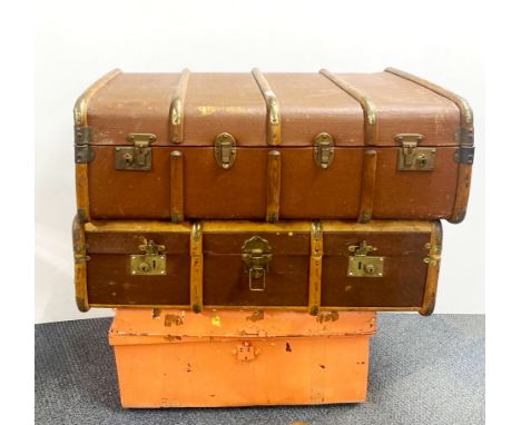 Two vintage wood and canvas cabin trunks and one tin trunk, largest 90 x 53 x 33cm.