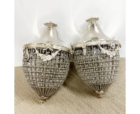 A pair of large silvered metal and crystal acorn light fittings, H. 50cm.