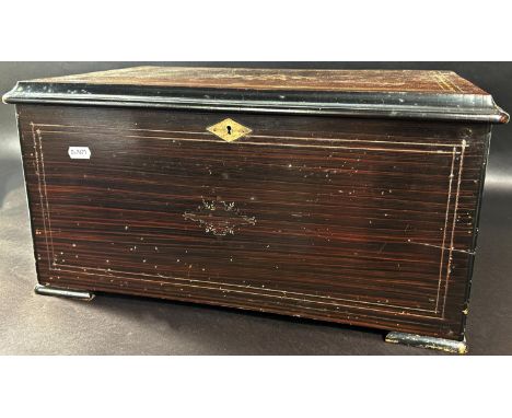 19th century musical box in a simulated rosewood case, the top with floral marquetry detail enclosing a mechanism with bells 