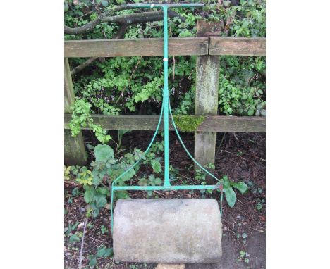 A 19th century stone garden roller with painted T shaped wrought iron handle, 56 cm wide 