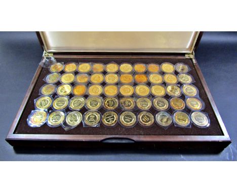 A complete collection of fifty silver gilt “Les Chefs- D’Oeuvre De L’ Impressionnisme” medallions featuring art works by Reno