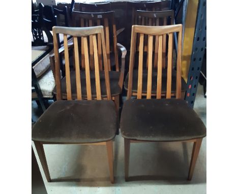 A set of six (4&amp;2) G plan teakwood stick back dining chairs with upholstered seats 