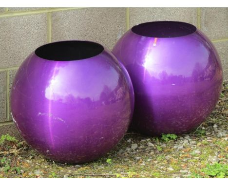 A pair of Lune contemporary purple metallic globular planters approximately 45 cm in diameter, together with a further contem