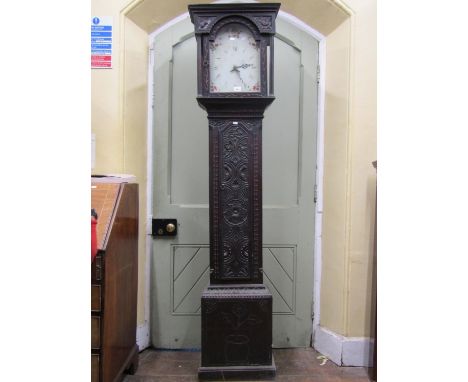 19th century cottage longcase clock, the oak case with later carved detail showing a geometric arrangement of birds, dolphins