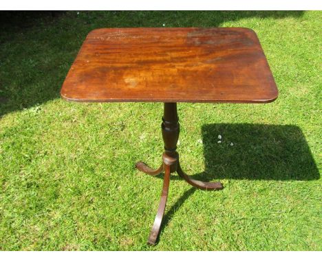 A Georgian mahogany occasional table the rectangular top raised on a vase shaped pillar and tripod, 53 cm max 