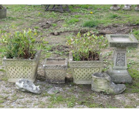 A pair of weathered Cotswold Studios square tapered cast composition stone planters with repeating panels, (planted) 40cm squ