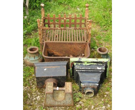 A weathered cast iron rectangular fire basket with urn finials,  a small cast iron wall mounted trough/planter 49 cm wide x 2