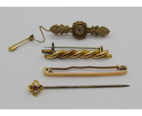 Group of antique gold jewellery comprising two 15ct brooches, a further unmarked rope twist brooch and a stick pin with 9ct r