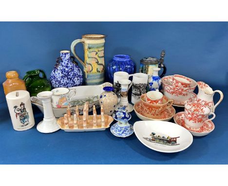 A collection of miscellaneous china to include a Bier Stein showing a snow maiden, 19th century moon flask with gilded handle