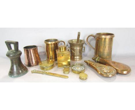 18th and 19th century copper and brass ware, including, three tankards, a pestle and mortar, two powder flasks, tea canister,