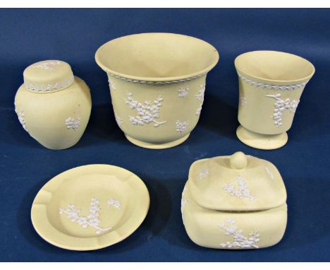 A collection of yellow Wedgwood Jasperware to include two vases, a small lidded ginger jar, further lidded trinket, small ash