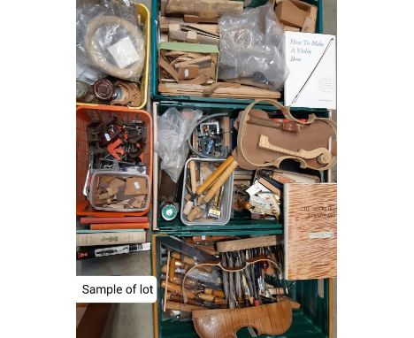 A comprehensive collection of violin making equipment including specialist tools, clamps, fittings, timbers, lengths of horse