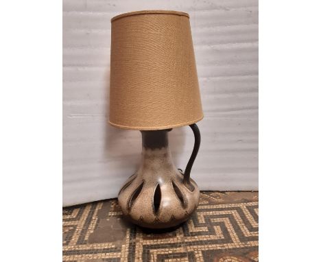 A mid 20th century ceramic table lamp and shade 