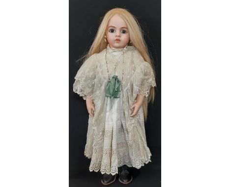 Good quality reproduction of late 19th century Bru Bébé Jeune doll by Carol with bisque socket head, kid body, kid over wood 