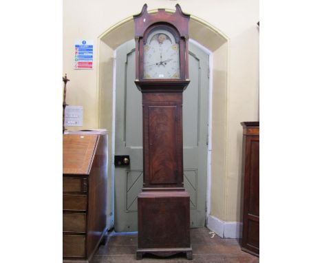 A regency mahogany longcase clock, the case with string inlaid detail, broken arch painted dial, subsidiary calendar and seco