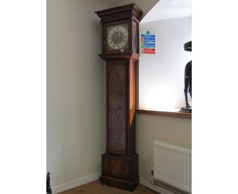 An 18th century London longcase clock in a walnut case, the full length door with a figured walnut finish, the square cut hoo