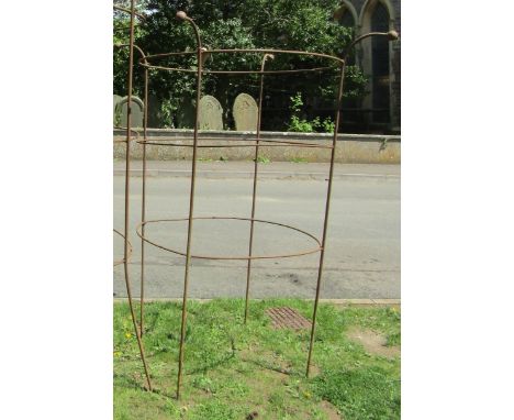 A large good quality weathered heavy gauge iron work obelisk of simple rod and ring construction with ball finials, approxima