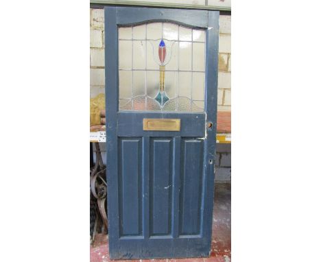 A large reclaimed painted pine front door partially enclosing a leaded light panel, 92 cm wide x 213 cm high (af) 