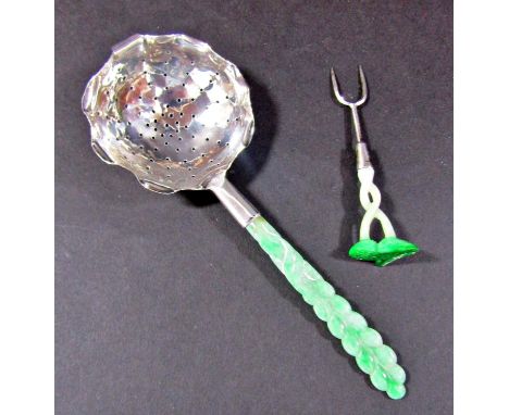 A Chinese silver metal tea strainer with jade handle and a Chinese silver metal fork with a twisted jade handle 