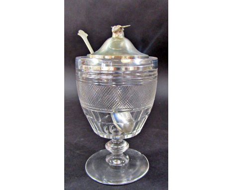 An early 20th century engraved glass honey pot with a silver bee decorated lid, a trefoil silver spoon, Sheffield, maker Coop