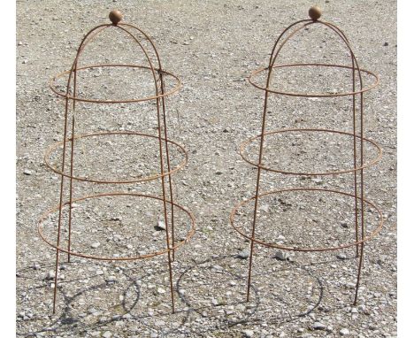 A pair of weathered light steel domed cylindrical garden obelisks with ball finials 50 cm diameter x 92 cm high
