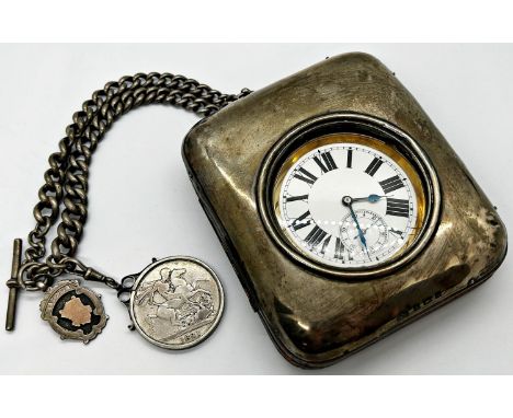 A Goliath pocket watch in a silver plated case, with heavy silver hallmarked chain and George IV silver crown fob, with later