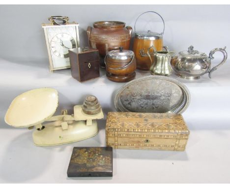 A miscellaneous collection of items including a kitchen scale and weights, a large brass finished mantel clock, a silver plat